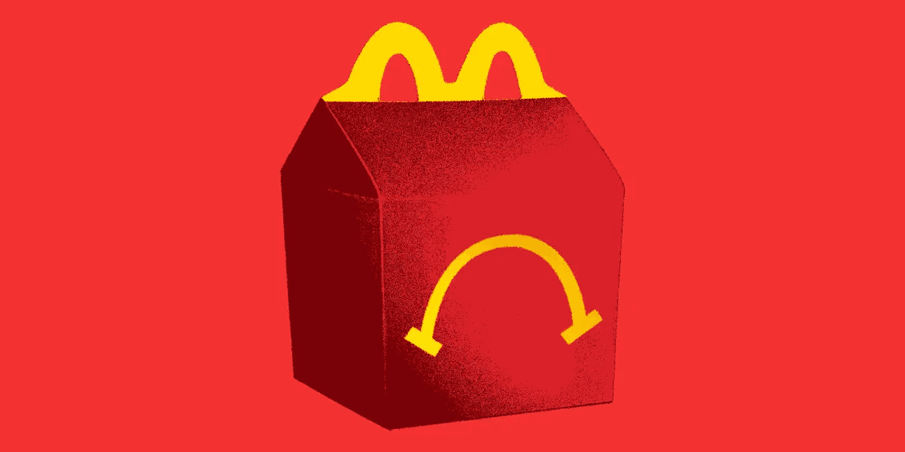 Imagem de caixa de Mcdonalds com fundo vermelho e símbolo de "tristeza" na caixa